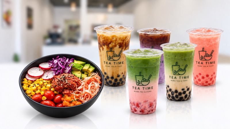 A Tea Time poke bowl next to brown sugar boba, strawberry matcha and other drinks in Tea Time cups