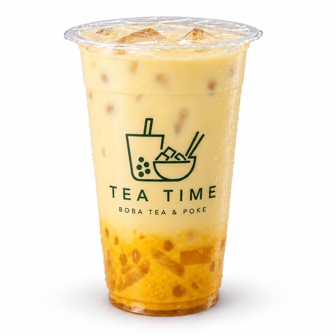 Triple mango green milk tea in a Tea Time glass